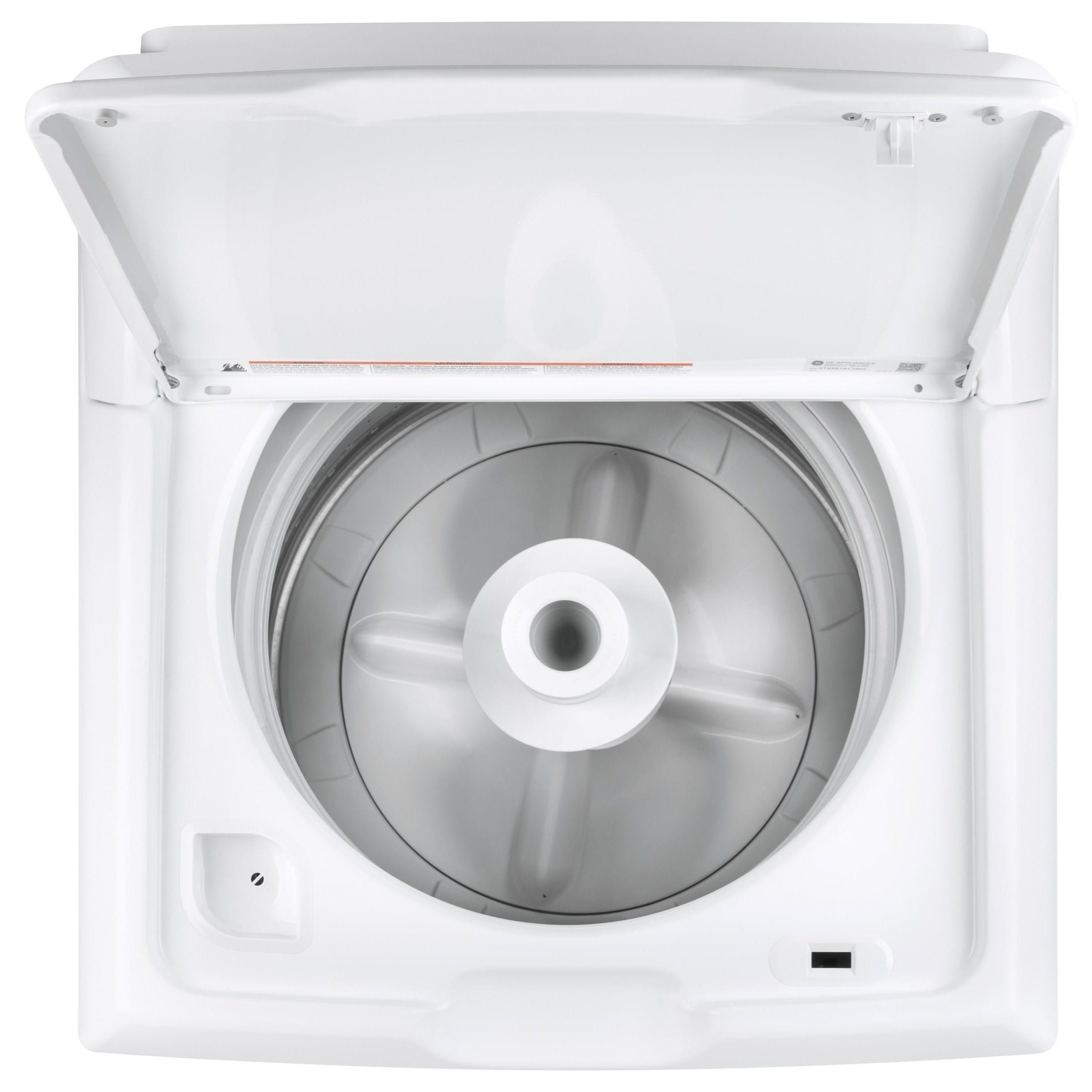 Stainless steel top load outlet washer and dryer